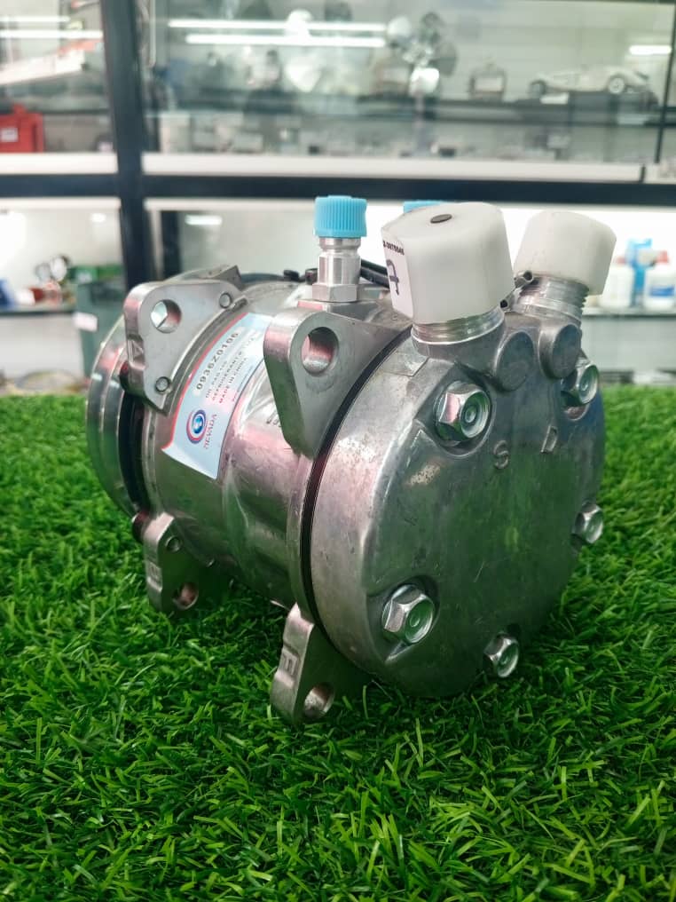 Compresor universal para aire acondicionado automotriz