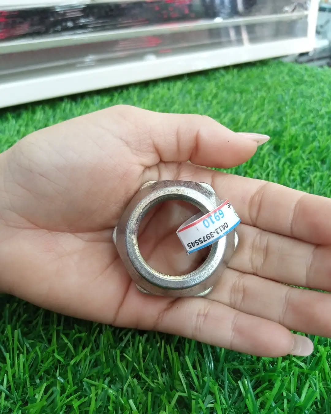 Tuerca metálica para tina de lavadora