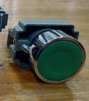 Botón pulsador industrial verde